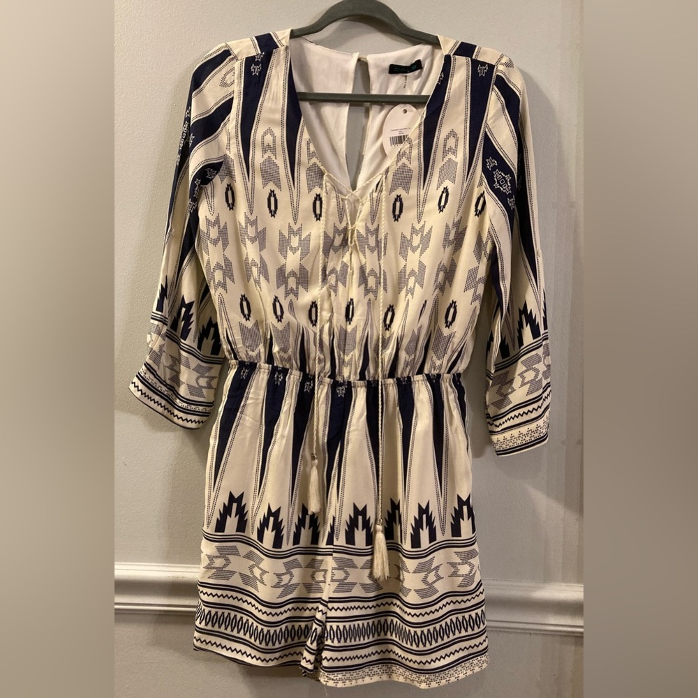 NWT - CALS Fascination Ivory Button Tap Romper